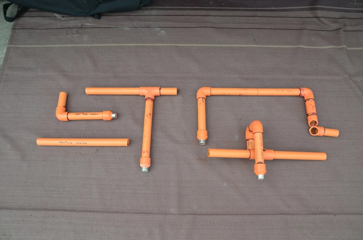 Forensic root-cause analysis of a plastic pipe failure behind a water-damage insurance claim.
