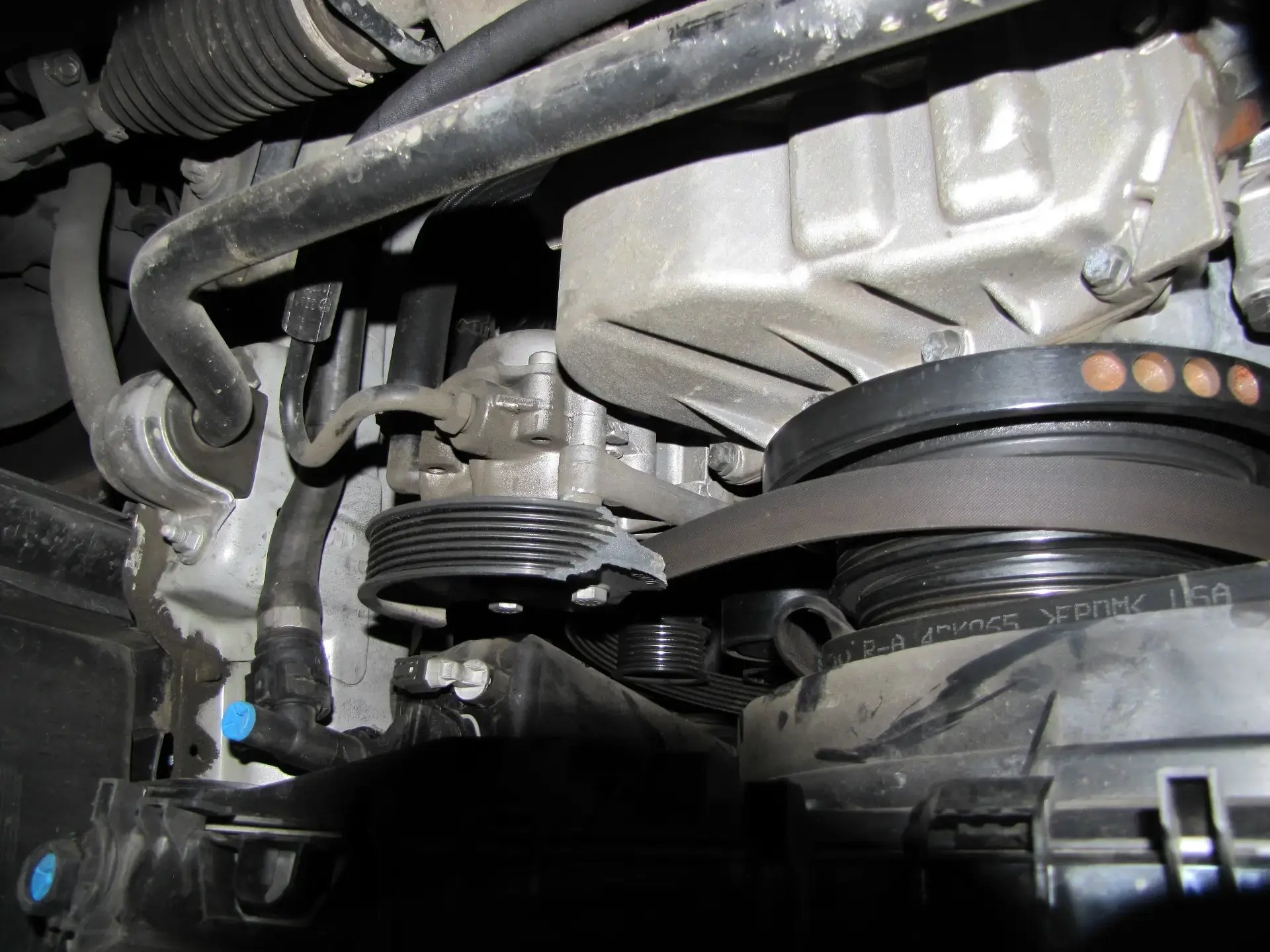 Failed plastic automotive component in engine bay — expert witness analysis of plastic bracket fracture by Plastic Expert Group