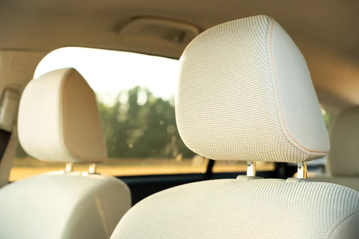 Automotive headrest foam material exposed during product liability failure analysis inspection