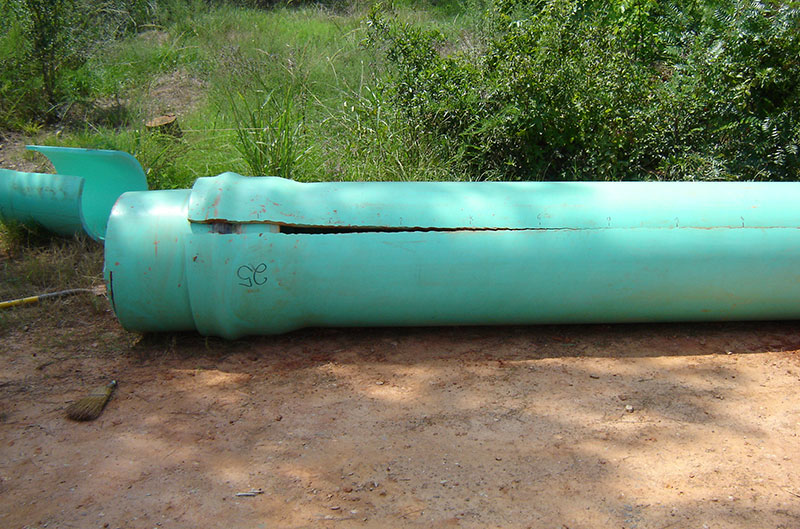 Photograph of a PVC pipe failure caused by over-belling